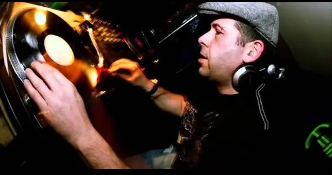 DJ Andy Farley mixing on decks