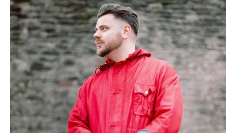 UK DJ/Producer Chaney in red coat